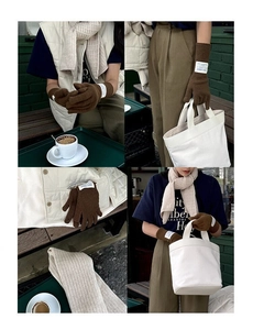 Detail of brown wool knit gloves with white Peace Garden label in an outdoor cafe setting