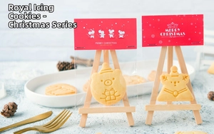 Detailed view of Christmas cookie molds showing cute bear and reindeer shapes in festive packaging