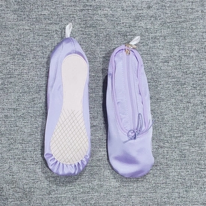Purple satin ballet shoe cosmetic pouch with non-slip sole and zipper closure