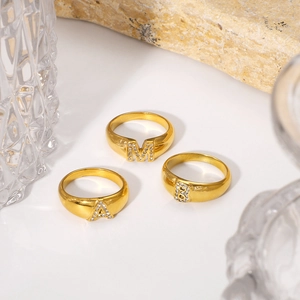 18K gold plated stainless steel letter rings with micro-set rhinestones in a minimalist style
