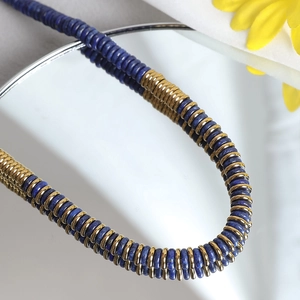 Lapis lazuli necklace with blue frisbee beads and gold metal spacers for women