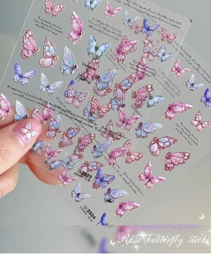 Detail showing 3D embossed butterfly nail art stickers with iridescent laser finish
