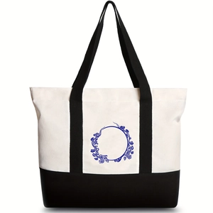 Large capacity canvas tote bag with black and white splicing and blue floral print