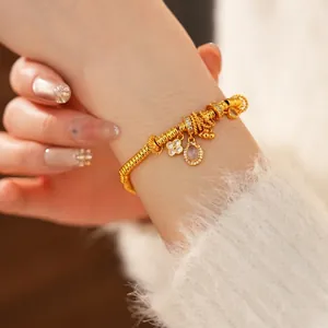 24k gold plated oval zircon flower bracelet with sparkling crystals on a female wrist