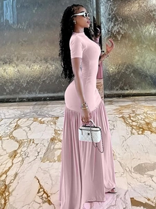 Pink short sleeve maxi dress with ruffled hem and slim fit design for women