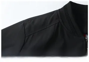 Detail of black flight jacket featuring smooth stitching and ribbed collar neck design