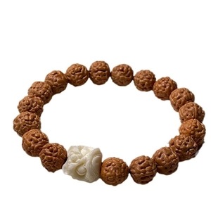 Rudraksha bodhi seed bracelet with a carved white beast charm for fashion accessory