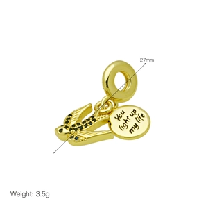 Golden swallow charm with 'You light up my life' engraving, 27mm height and 3.5g weight