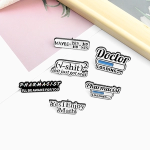 Detailed view of six enamel pins with creative pharmacy and math formulas on white background