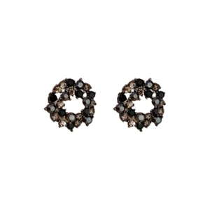 French style hollow circular stud earrings with vintage crystals on a white background
