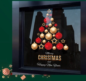 Détail du sticker sapin de Noël rouge et doré avec ornements festifs et motifs d'étoiles