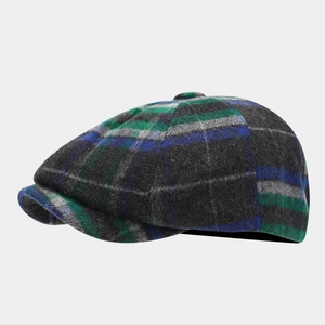Side view of newsboy cap with multi-color checkered pattern and wool texture detail
