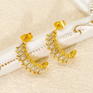 U-shaped gold stainless steel earrings with rectangular zircons in a luxury minimalist style
