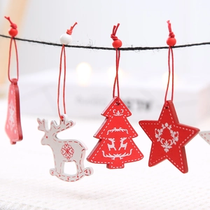 Set of Christmas wood hanging ornaments featuring bells, deer, trees, and star patterns