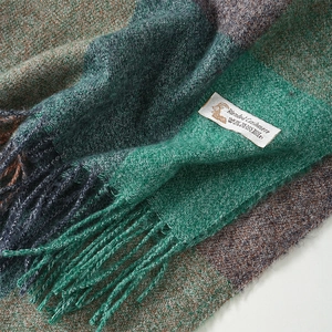 Classic checkered cashmere blend scarf in dark green and brown with soft fringe edges