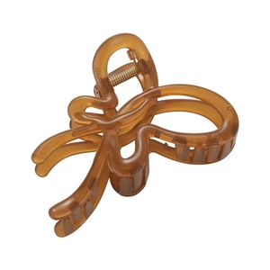 Translucent amber butterfly hair claw clip with high-quality metal spring on white background