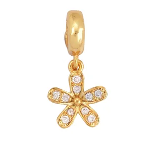 Detailed size specifications of a 14K gold plated flower charm with white cubic zirconia