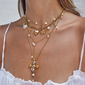 Layered 18K gold stainless steel necklace with heart, angel and cross pearl pendants