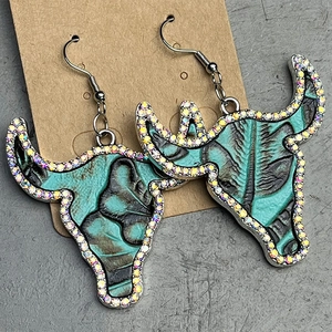 Vintage bull head earrings with turquoise leather texture and sparkling rhinestones
