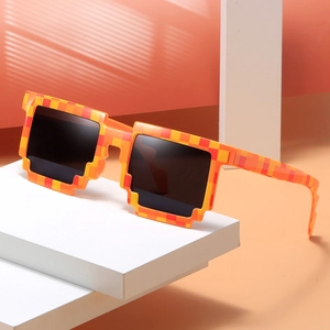 Retro pixel art mosaic sunglasses with orange and yellow frames on a geometric stand
