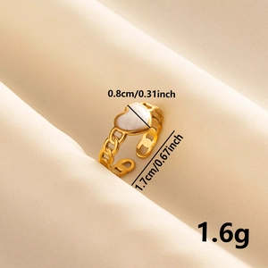 Detail view of gold heart ring dimensions 1.7cm diameter and 0.8cm height with size labels