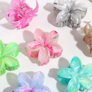 Elegant floral acetate hair claws with marble texture in multiple pastel colors