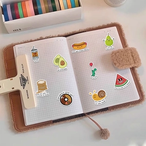50 funny pun stickers with food and animals on a grid notebook for decoration