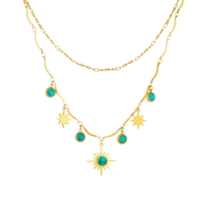 Double-layered gold necklace with turquoise sun and star pendants on white background