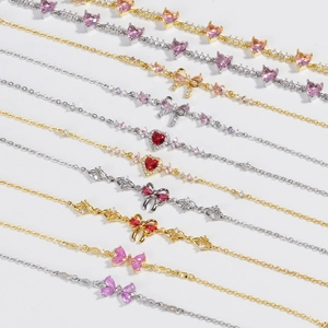 Minimalist heart and bow charm bracelets with zircon in gold and silver plating