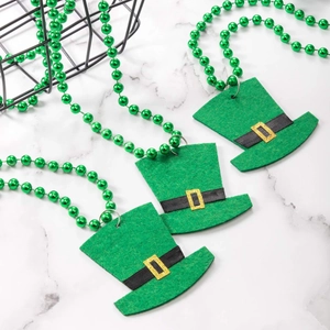 Detailed shot of green beaded necklaces featuring felt St. Patrick's Day shamrock hats