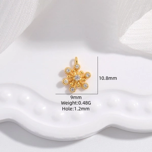 S925 sterling silver gold snowflake pendant with zircon stones measuring 10.8mm by 9mm