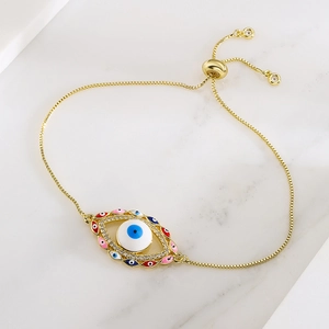 Bohemian evil eye gold bracelet with enamel eye charm and adjustable zircon slide chain