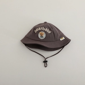 Detail view of baby sun hat with cute bear embroidery and adjustable windproof strap