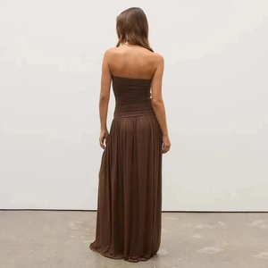 Detailed back view of brown strapless maxi dress with gathered smocked fabric design