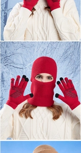 Detail of red knitted balaclava and touch screen gloves with anti-slip palm grip