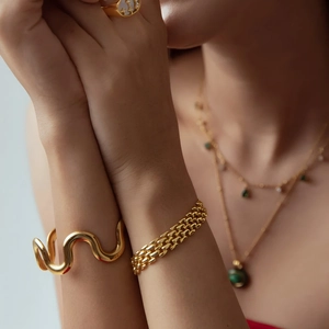 Elegant 18k gold plated stainless steel wavy bangle and layered jewelry set for women