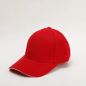 Detail of red six-panel baseball cap with white sandwich brim for sun protection