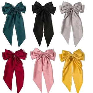 Set of six large satin bow hair clips with long ribbons in assorted elegant colors