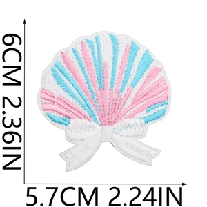 Detail of pink and blue seashell embroidery patch with size dimensions 6cm x 5.7cm