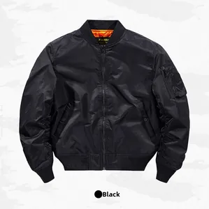Detail of black flight jacket featuring orange lining and sleeve zip pocket