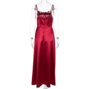 Detail of burgundy satin evening dress showing the back zip and adjustable thin straps