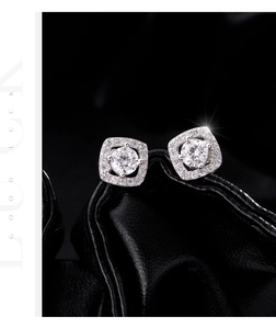 Close-up of elegant S925 sterling silver square halo stud earrings with sparkling stones