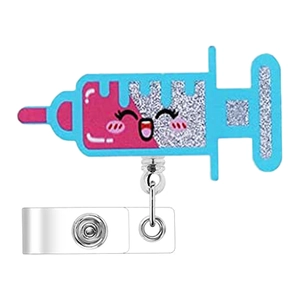 Detail of syringe-shaped acrylic badge reel with pink face and silver glitter accents