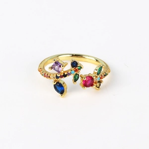 Detailed top view of gold adjustable open ring with multi-color cubic zirconia stones