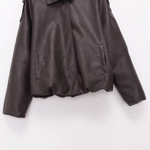 Fashionable dark brown faux leather jacket with smooth texture and casual loose fit design