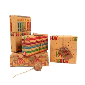Brown kraft birthday wrapping paper set with Happy Birthday patterns and jute twine