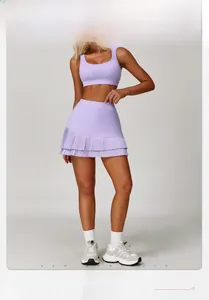 Detail of purple yoga set featuring a pleated tennis skirt and high-elastic sports bra