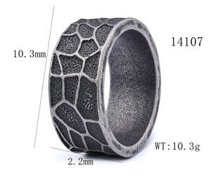 Detail of vintage punk stainless steel ring showing 10.3mm width and lava texture