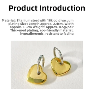 Detail view of 18k gold plated heart earrings in stainless steel, size 2.4x1.5cm