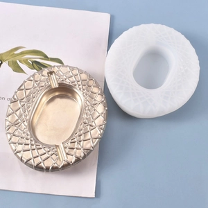 Detailed silicone mold and metallic gold resin ashtray with geometric diamond patterns
